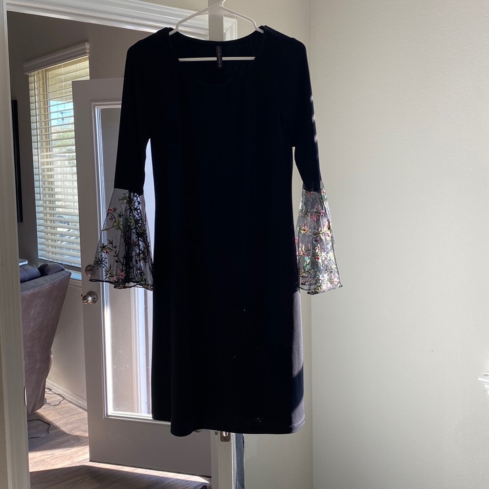 Black dress with flower sleeve detail